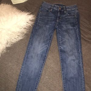 Medium wash american eagle mid rise jeggings